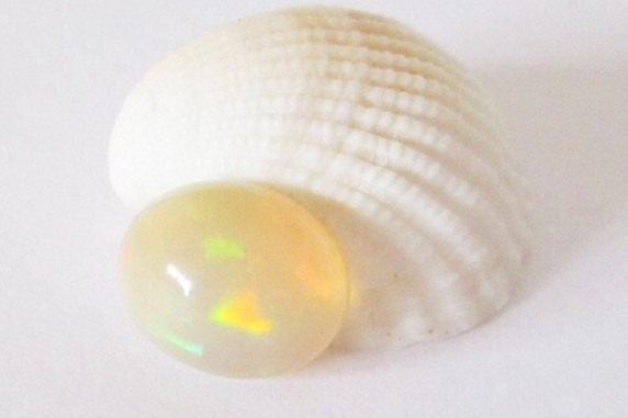 Ethiopian Opal 11x9mm Oval Cabochon 2.80cts